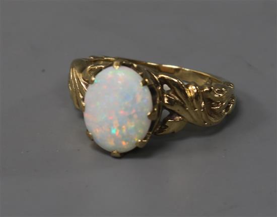 A 9ct? gold and white opal dress ring, size I.